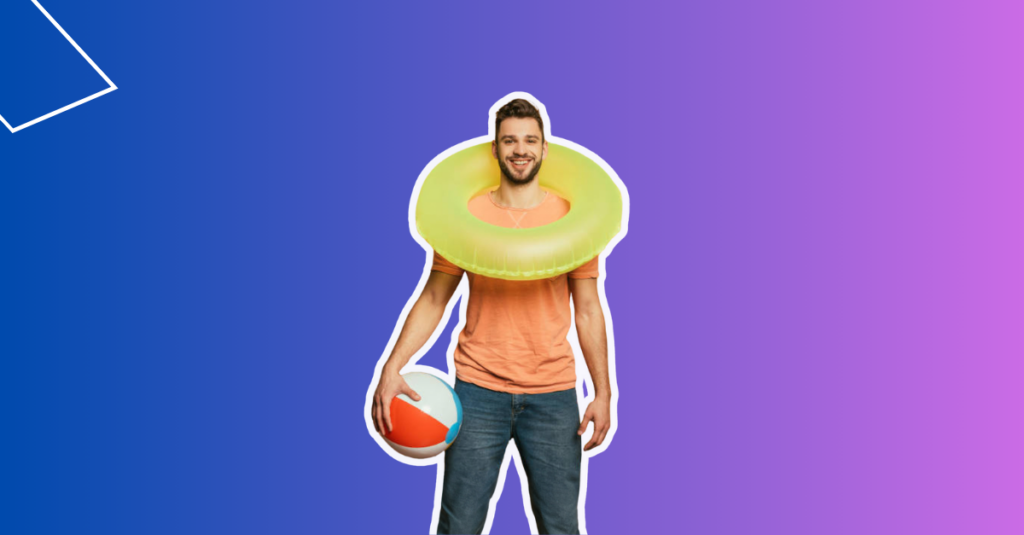 Man standing in orange shirt ith beach ball in left hand and rubber ring around his neck